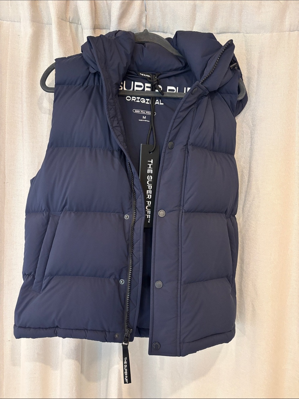 Aritzia new with tags super puff vest Navy size medium.